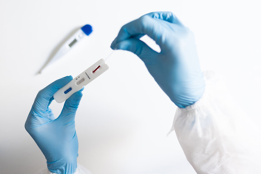 Doctor testing using the rapid test device for COVID-19, the new 2019 coronavirus