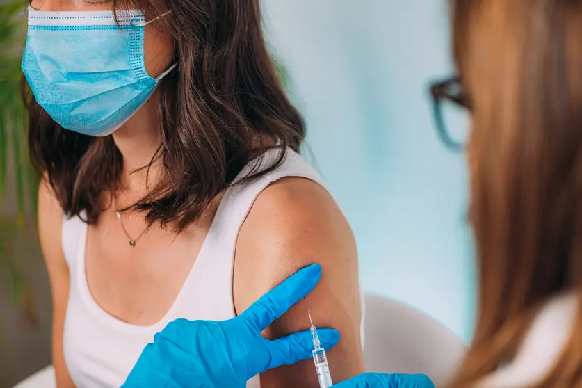 Woman Getting a Corona Virus Vaccine Trial