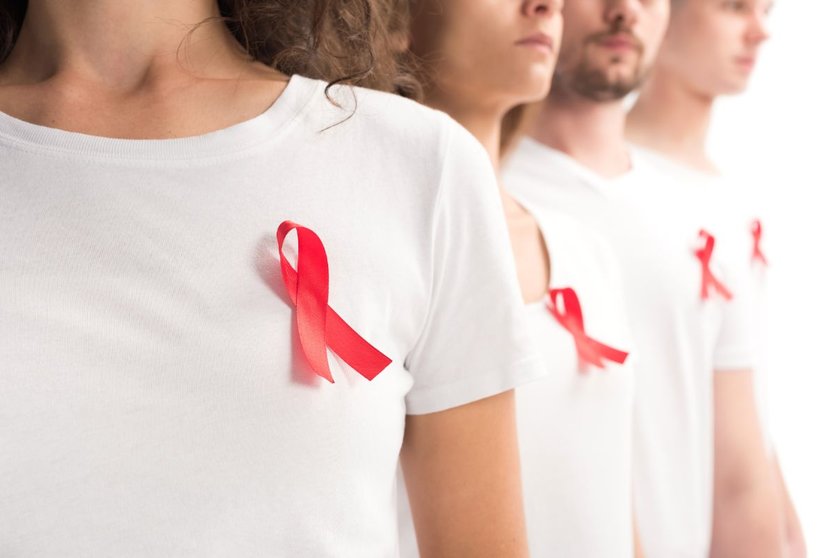 cropped-image-of-people-standing-with-red-ribbons-2022-11-02-01-51-46-utc (1)