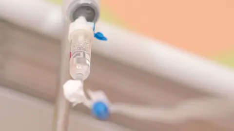 Infusion Saline drip to the patient in hospital 