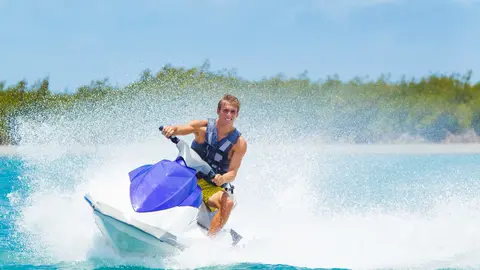 Man on Jet Ski having fun in Ocean