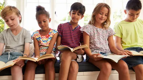 group-of-multi-cultural-children-reading-on-window-2021-08-26-16-13-15-utc (2) (1)