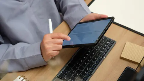 asian-woman-use-mobile-while-video-conference-meet-2022-12-16-10-03-11-utc (1)