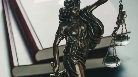 statue-of-the-figure-of-justice-holding-scales-2022-12-16-12-33-47-utc (1)