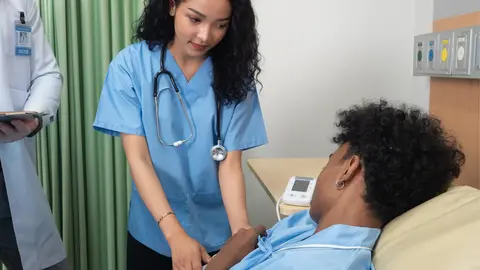 in-hospital-treatment-room-patient-laying-on-the-b-2024-10-14-23-08-29-utc (1)